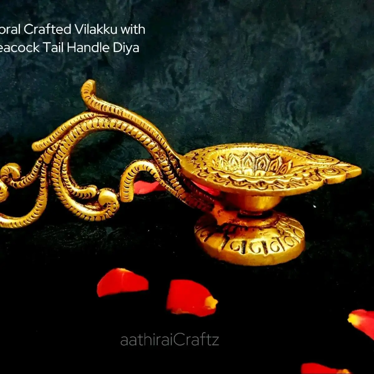 Floral Crafted Vilakku with Peacock Tail Handle Brass Antique FinishThingal Essentials LLP