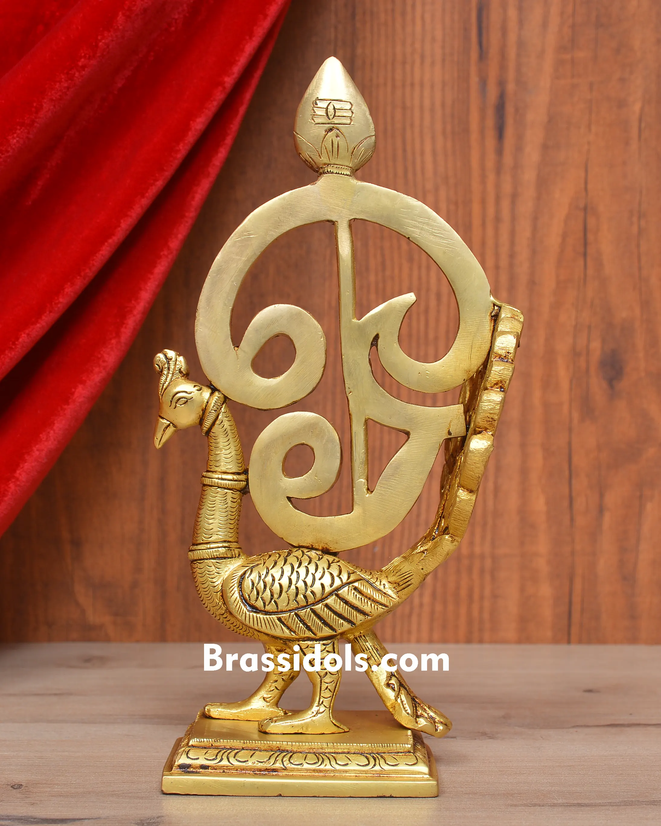 BRASS OM VEL PEACOCK