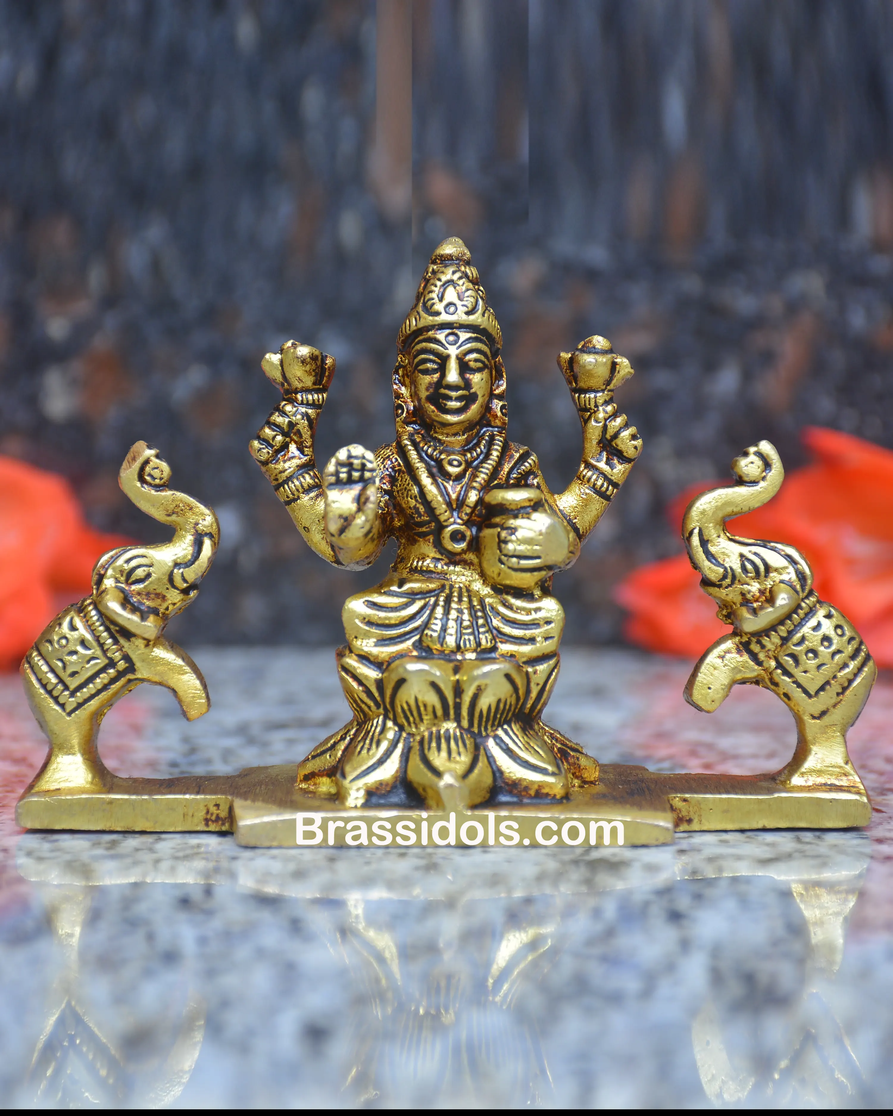 SITTING KAMAL LAXMI WITH ELEPHANT