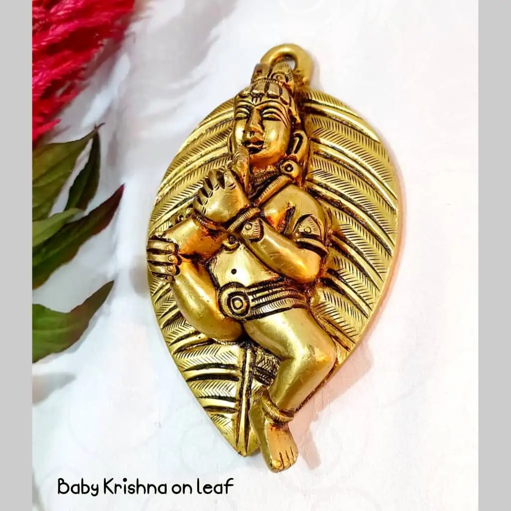 Hanging Baby Krishna on leaf