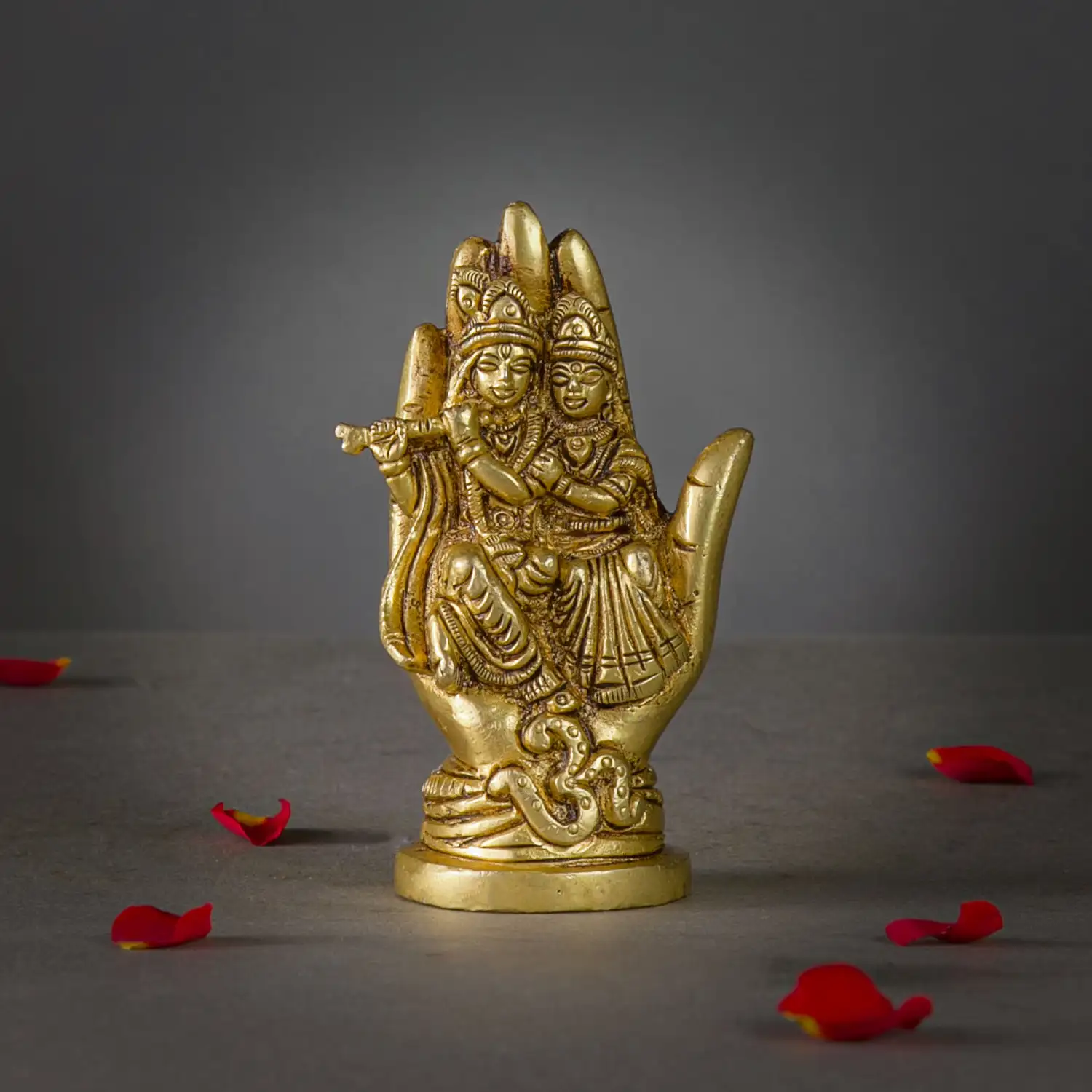 4 inches brass Radha Krishna sitting on hand idol