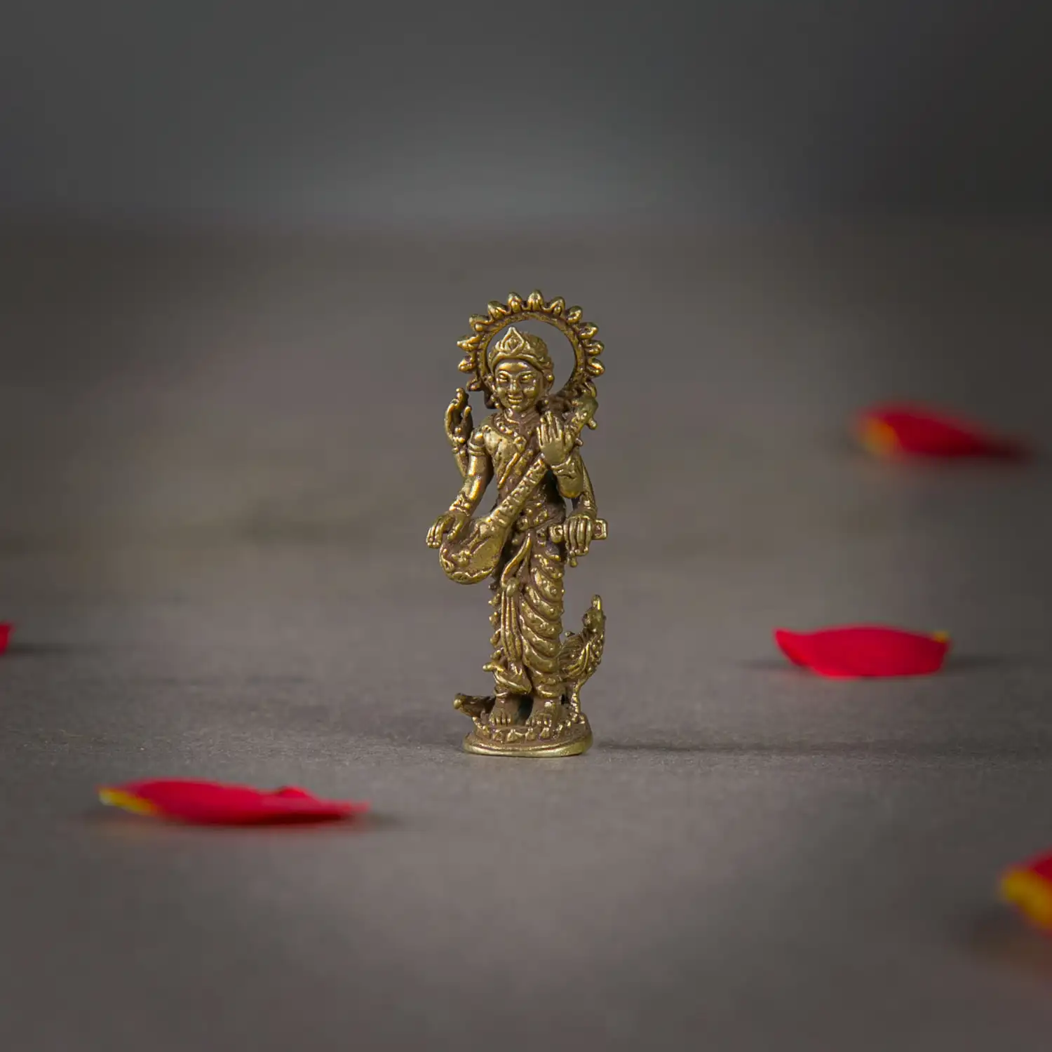1 inch miniature brass standing Saraswathi with Peacock Idol