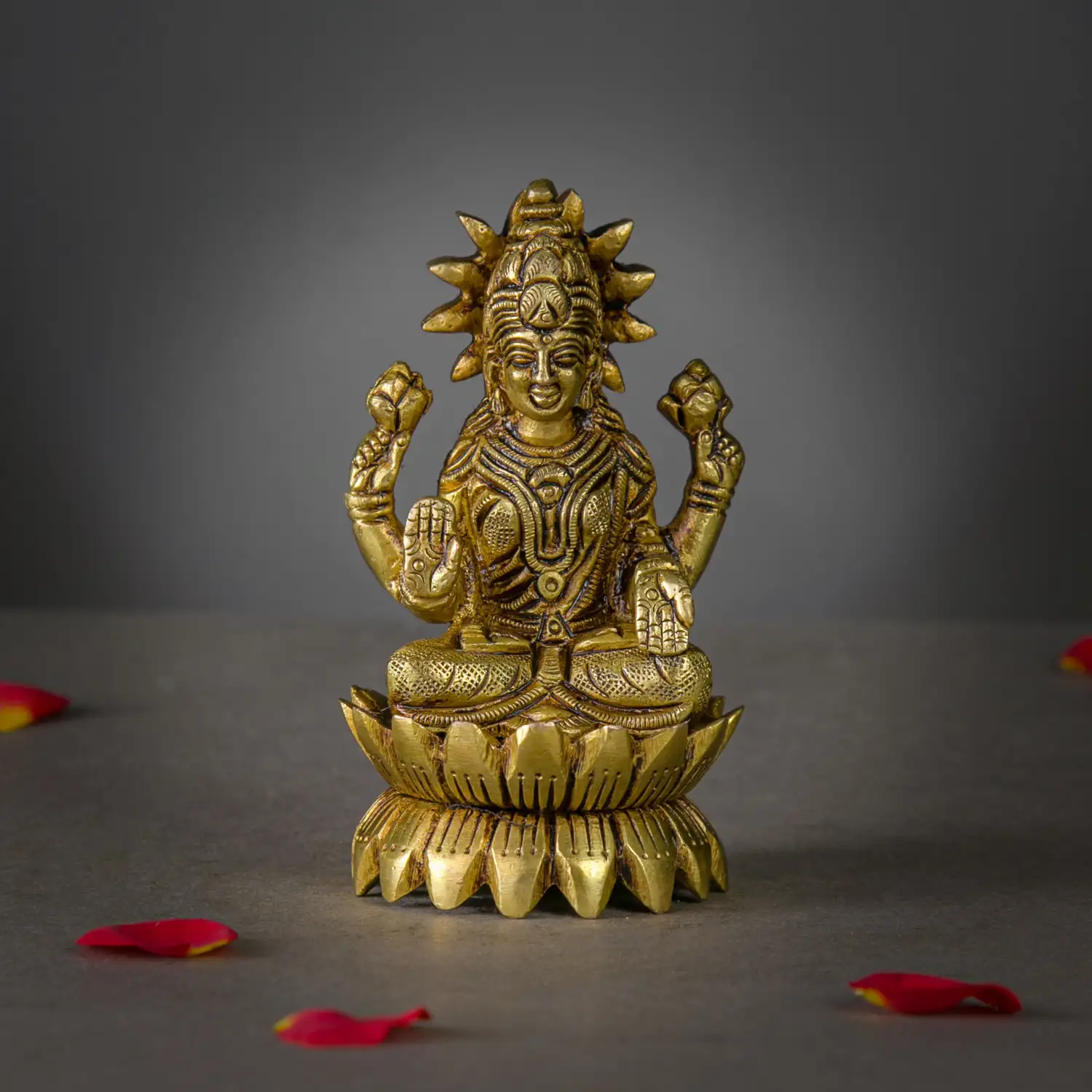 4 inches brass Lotus Sitting Lakshmi idol