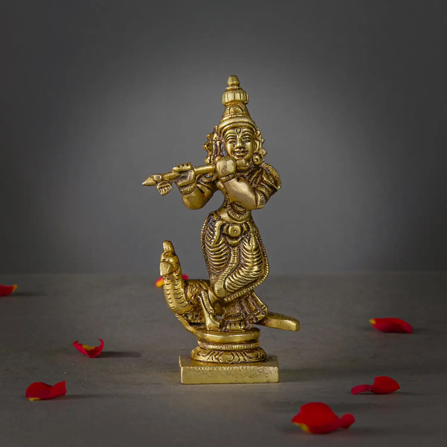 4.5 inches brass Krishna with peacock idol