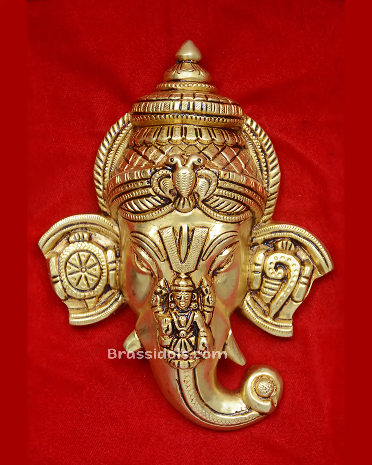 Brass Wallhanging Ganesh face Lakshmi and shank Chakra - 9 inches